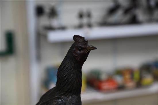 A Japanese bronze model of a cockerel, Meiji period, total height 39cm, loss to one tail feather